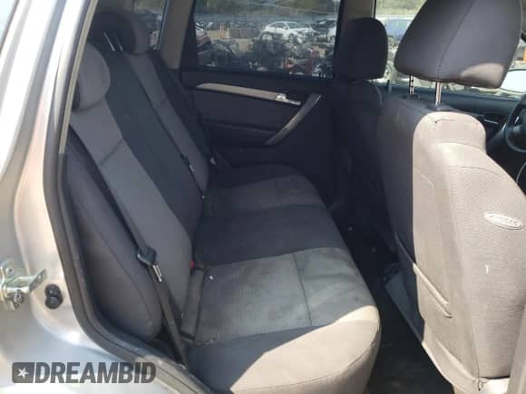 2009 Chevrolet Aveo 1LT z VIN KL1TD66E29B364114, wystawiony jako Copart lot #70609694 z przebiegiem 45 845 mil mil oraz Szkoda całkowita • Salvage title. Historia ofert i sprzedaży dostępna na DreamBid. Obrazek 10.