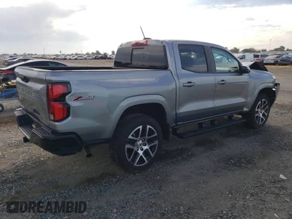 2024 Chevrolet Colorado 4WD Z71 with VIN 1GCPTDEKXR1303883, listed as a Copart auction lot 84041475 with 4,447 mi miles and Salvage title. Bid and sale history available at DreamBid. Image 3.