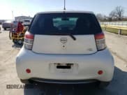 ✅ 2013 Scion iQ • VIN: JTNJJXB07DJ025920 • Lot: 48676745. Listed on Copart with 143,294 mi. Free auction sales archive from the USA and detailed vehicle history report at DreamBid. Image 6.