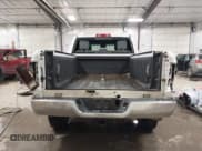 ✅ 2018 Ram 2500 SLT • VIN: 3C6TR5DTXJG284102 • Lot: 41609869. Listed on IAAI with 148,869 mi. Free auction sales archive from the USA and detailed vehicle history report at DreamBid. Image 17.