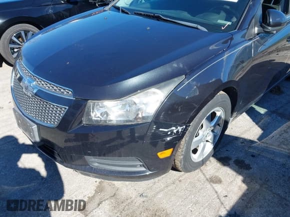 ✅ 2014 Chevrolet Cruze 1LT • VIN: 1G1PC5SB6E7365436 • Lot: 43484529. Listed on IAAI with 130,672 mi. Free auction sales archive from the USA and detailed vehicle history report at DreamBid. Image 6.
