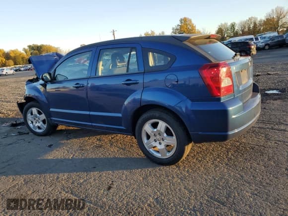 ✅ 2009 Dodge Caliber SXT • VIN: 1B3HB48AX9D197736 • Лот: 79969934. Опубликован ранее на Copart с пробегом Не указан. Бесплатный доступ к архиву аукционных продаж из США и подробный отчёт об истории автомобиля на DreamBid. Изображение 2.
