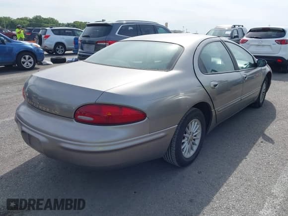 ✅ 1999 Chrysler Concorde • VIN: 2C3HD46J2XH558909 • Lot: 43070725. Listed on IAAI with 118,396 mi. Free auction sales archive from the USA and detailed vehicle history report at DreamBid. Image 4.