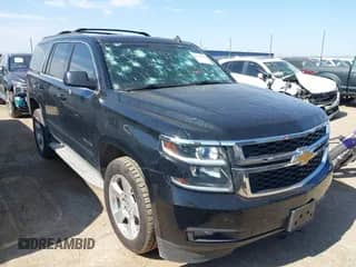 2015 Chevrolet Tahoe LT with VIN 1GNSCBKC3FR291270, listed as a IAAI auction lot 42670643 with 128,255 mi miles and . Bid and sale history available at DreamBid. Image 1.