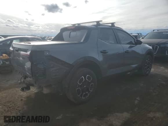 2022 Hyundai Santa Cruz SEL с VIN 5NTJCDAEXNH018773, выставлен на аукционе Copart как лот 88129645 с пробегом 42 545 миль миль и Списание • Salvage title. История ставок и продаж доступна на DreamBid. Изображение 3.