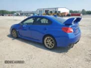 ✅ 2015 Subaru WRX STI Launch • VIN: JF1VA2W6XF9800907 • Lot: 61059575. Listed on Copart with 106,215 mi. Free auction sales archive from the USA and detailed vehicle history report at DreamBid. Image 2.