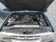 1997 Ford Explorer XL z VIN 1FMDU34E1VZC23403, wystawiony jako Copart lot #80118535 z przebiegiem 148 381 mil mil oraz Nie do naprawy • Non repairable. Historia ofert i sprzedaży dostępna na DreamBid. Obrazek 11.