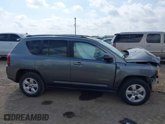 ✅ 2014 Jeep Compass Sport • VIN: 1C4NJCBA8ED505004 • Lot: 43511315. Listed on IAAI with 122,454 mi. Free auction sales archive from the USA and detailed vehicle history report at DreamBid. Image 13.