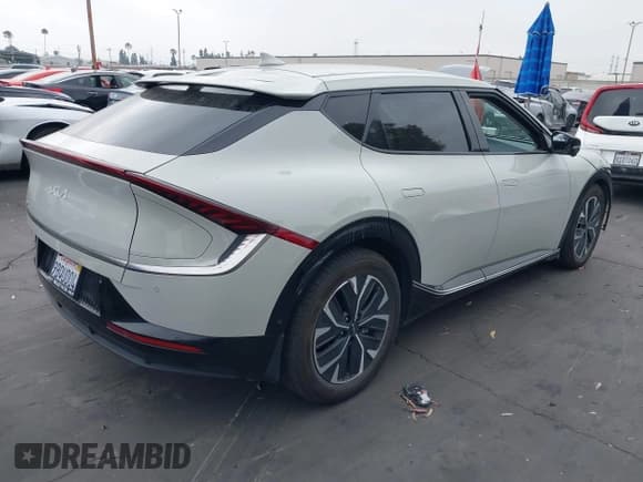 ✅ 2022 Kia EV6 Wind • VIN: KNDC3DLC6N5057976 • Lot: 42643946. Listed on IAAI with 66,952 mi. Free auction sales archive from the USA and detailed vehicle history report at DreamBid. Image 4.