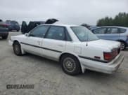 ✅ 1990 Toyota Camry • VIN: 4T1SV22E6LU267277 • Lot: 80152155. Wystawiony na Copart z przebiegiem 116 056 mil. Bezpłatny archiwum sprzedaży aukcyjnych z USA i szczegółowy raport historii pojazdu na DreamBid. Zdjęcie 2.