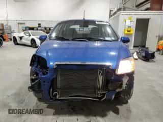 2011 Chevrolet Aveo 1LT z VIN KL1TD5DEXBB140334, wystawiony jako Copart lot #41641515 z przebiegiem 52 399 mil mil oraz Szkoda całkowita • Salvage title. Historia ofert i sprzedaży dostępna na DreamBid. Obrazek 5.