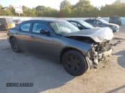 ✅ 2010 Dodge Charger Police • VIN: 2B3AA4CT5AH240559 • Lot: 43431732. Listed on IAAI with 119,900 mi. Free auction sales archive from the USA and detailed vehicle history report at DreamBid. Image 1.