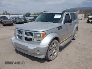 ✅ 2007 Dodge Nitro R/T • VIN: 1D8GU58657W724820 • Lot: 42993207. Listed on IAAI with 174,862 mi. Free auction sales archive from the USA and detailed vehicle history report at DreamBid. Image 2.