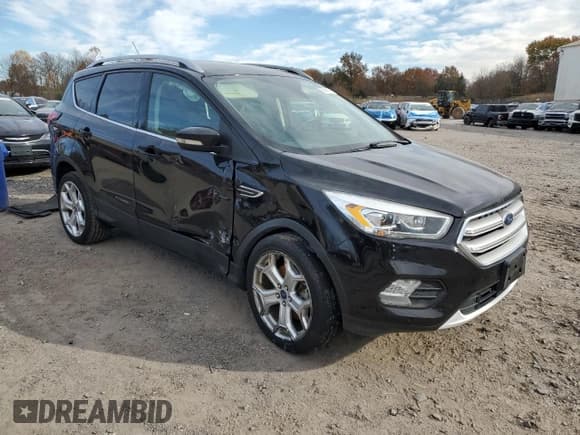 ✅ 2019 Ford Escape Titanium • VIN: 1FMCU0J95KUB74166 • Лот: 90966355. Опубликован ранее на Copart с пробегом 84 088 миль. Бесплатный доступ к архиву аукционных продаж из США и подробный отчёт об истории автомобиля на DreamBid. Изображение 4.