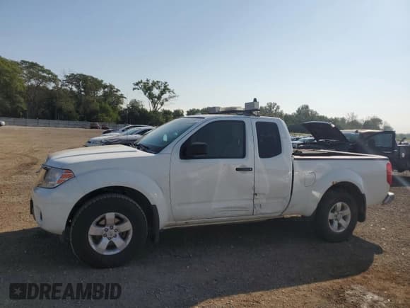 ✅ 2013 Nissan Frontier SV • VIN: 1N6AD0CW2DN733892 • Lot: 68198815. Listed on Copart with 104,495 mi. Free auction sales archive from the USA and detailed vehicle history report at DreamBid. Image 1.
