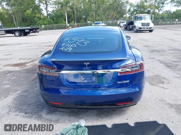 ✅ 2021 Tesla Model S Performance • VIN: 5YJSA1E43MF424593 • Lot: 42198084. Listed on IAAI with 74,546 mi. Free auction sales archive from the USA and detailed vehicle history report at DreamBid. Image 16.