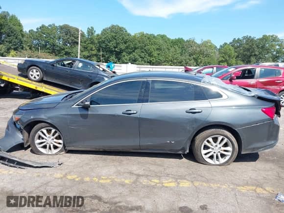 2018 Chevrolet Malibu LT z VIN 1G1ZD5ST2JF160114, wystawiony jako IAAI lot #43063782 z przebiegiem 117 178 mil mil oraz . Historia ofert i sprzedaży dostępna na DreamBid. Obrazek 14.
