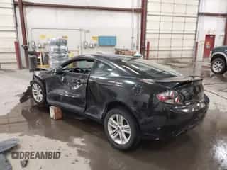 2007 Hyundai Tiburon GS z VIN KMHHM66DX7U255080, wystawiony jako IAAI lot #42128738 z przebiegiem 160 428 mil mil oraz . Historia ofert i sprzedaży dostępna na DreamBid. Obrazek 3.