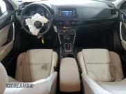 ✅ 2014 Mazda CX-5 Sport • VIN: JM3KE2BE3E0423037 • Lot: 61423335. Listed on Copart with 168,574 mi. Free auction sales archive from the USA and detailed vehicle history report at DreamBid. Image 8.