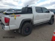 ✅ 2017 Toyota Tacoma SR5 • VIN: 3TMCZ5AN8HM077203 • Lot: 41765910. Listed on IAAI with 170,863 mi. Free auction sales archive from the USA and detailed vehicle history report at DreamBid. Image 4.