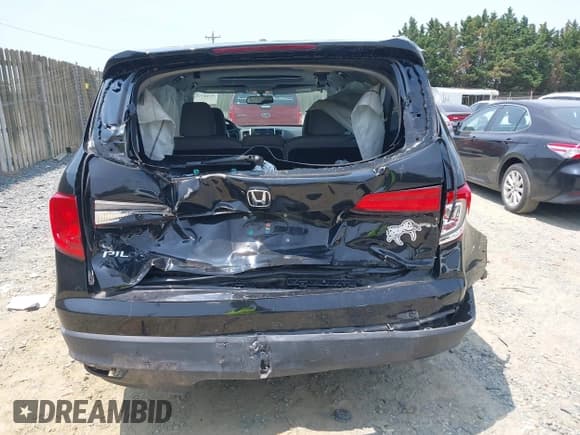 ✅ 2017 Honda Pilot EX-L • VIN: 5FNYF5H50HB018073 • Lot: 42417778. Listed on IAAI with 60,784 mi. Free auction sales archive from the USA and detailed vehicle history report at DreamBid. Image 16.