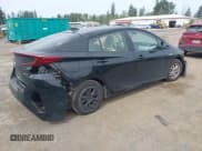 ✅ 2021 Toyota Prius LE • VIN: JTDKAMFP0M3179016 • Lot: 42204095. Listed on IAAI with 34,691 mi. Free auction sales archive from the USA and detailed vehicle history report at DreamBid. Image 4.