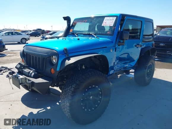 2012 Jeep Wrangler Sport с VIN 1C4GJWAG8CL199036, выставлен на аукционе IAAI как лот 43443659 с пробегом 100 492 миль миль и . История ставок и продаж доступна на DreamBid. Изображение 2.