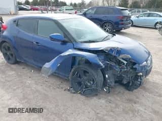 2017 Hyundai Veloster z VIN KMHTC6AD7HU318304, wystawiony jako IAAI lot #41726043 z przebiegiem 63 050 mil mil oraz . Historia ofert i sprzedaży dostępna na DreamBid. Obrazek 1.