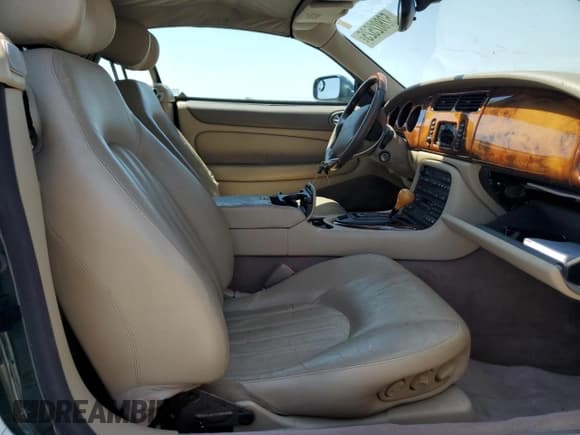 ✅ 2002 Jaguar XK • VIN: SAJDA42C62NA25816 • Lot: 52802525. Wystawiony na Copart z przebiegiem Nie podano. Bezpłatny archiwum sprzedaży aukcyjnych z USA i szczegółowy raport historii pojazdu na DreamBid. Zdjęcie 10.