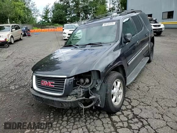 ✅ 2004 GMC Envoy SLT • VIN: 1GKET16S046203411 • Lot: 68126125. Listed on Copart with 246,450 mi. Free auction sales archive from the USA and detailed vehicle history report at DreamBid. Image 14.