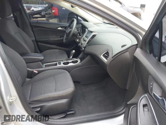 ✅ 2018 Chevrolet Cruze LS • VIN: 1G1BC5SM5J7214433 • Lot: 42616404. Listed on IAAI with 171,129 mi. Free auction sales archive from the USA and detailed vehicle history report at DreamBid. Image 5.