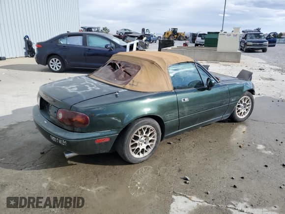 ✅ 1997 Mazda MX-5 Miata • VIN: JM1NA3538V0725876 • Лот: 90658605. Опубликован ранее на Copart с пробегом 212 299 миль. Бесплатный доступ к архиву аукционных продаж из США и подробный отчёт об истории автомобиля на DreamBid. Изображение 3.