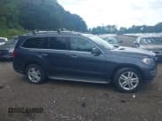 ✅ 2013 Mercedes-Benz GL 450 • VIN: 4JGDF7CE5DA242326 • Lot: 43123721. Wystawiony na IAAI z przebiegiem 201 778 mil. Bezpłatny archiwum sprzedaży aukcyjnych z USA i szczegółowy raport historii pojazdu na DreamBid. Zdjęcie 13.