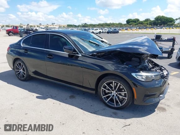 ✅ 2021 BMW 3 Series 330e • VIN: 3MW5P7J03M8B77532 • Lot: 43021005. Listed on IAAI with 59,787 mi. Free auction sales archive from the USA and detailed vehicle history report at DreamBid. Image 1.