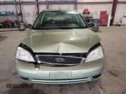 ✅ 2007 Ford Focus S • VIN: 1FAFP34NX7W288751 • Lot: 83770905. Wystawiony na Copart z przebiegiem 128 421 mil. Bezpłatny archiwum sprzedaży aukcyjnych z USA i szczegółowy raport historii pojazdu na DreamBid. Zdjęcie 5.