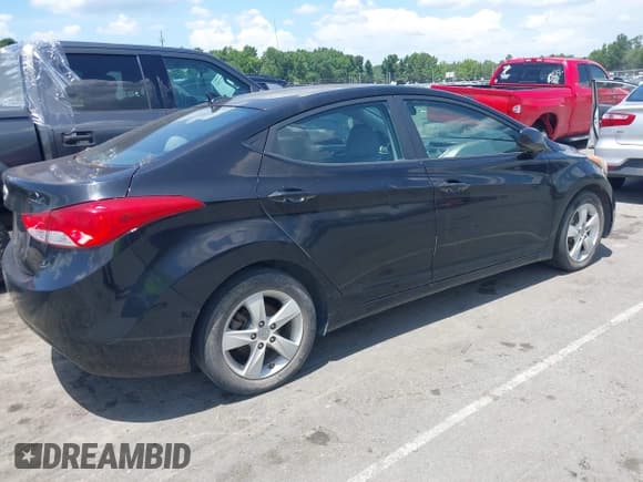 ✅ 2012 Hyundai Elantra Limited • VIN: KMHDH4AEXCU174890 • Lot: 42788457. Listed on IAAI with 154,352 mi. Free auction sales archive from the USA and detailed vehicle history report at DreamBid. Image 4.
