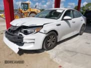 ✅ 2016 Kia Optima LX Turbo • VIN: 5XXGT4L14GG079649 • Lot: 43510554. Listed on IAAI with 157,300 mi. Free auction sales archive from the USA and detailed vehicle history report at DreamBid. Image 2.