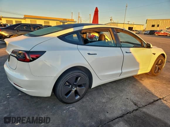 ✅ 2023 Tesla Model 3 • VIN: 5YJ3E1EA5PF596756 • Лот: 91879025. Опубликован ранее на Copart с пробегом 47 552 миль. Бесплатный доступ к архиву аукционных продаж из США и подробный отчёт об истории автомобиля на DreamBid. Изображение 3.