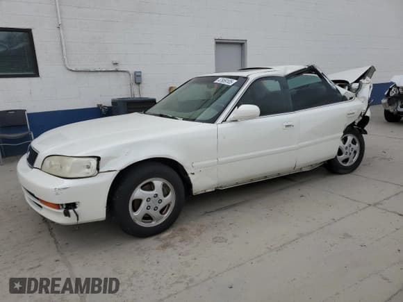 ✅ 1998 Acura TL • VIN: JH4UA3640WC009751 • Лот: 47659105. Опубликован ранее на Copart с пробегом 220 653 миль. Бесплатный доступ к архиву аукционных продаж из США и подробный отчёт об истории автомобиля на DreamBid. Изображение 1.