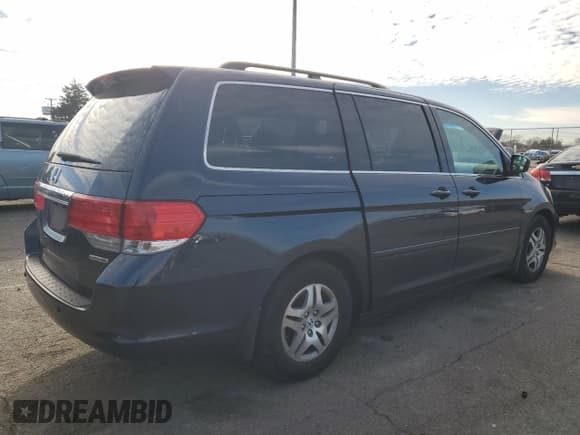 ✅ 2009 Honda Odyssey Touring • VIN: 5FNRL388X9B036741 • Лот: 83679014. Опубликован ранее на Copart с пробегом 131 874 миль. Бесплатный доступ к архиву аукционных продаж из США и подробный отчёт об истории автомобиля на DreamBid. Изображение 3.