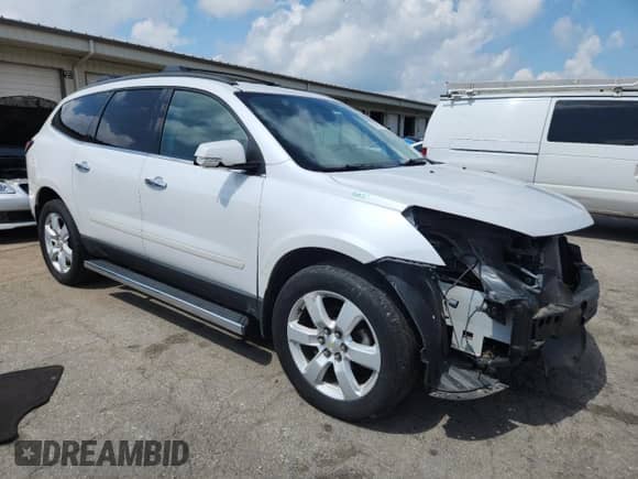2016 Chevrolet Traverse LT with VIN 1GNKRGKD4GJ240851, listed as a Copart auction lot 62824275 with 99,928 mi miles and Salvage title. Bid and sale history available at DreamBid. Image 4.