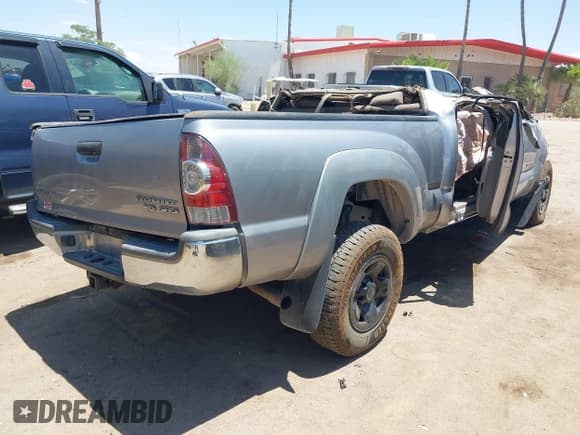 ✅ 2015 Toyota Tacoma PreRunner • VIN: 5TFKU4HNXFX005985 • Lot: 42583474. Listed on IAAI with 160,000 mi. Free auction sales archive from the USA and detailed vehicle history report at DreamBid. Image 4.
