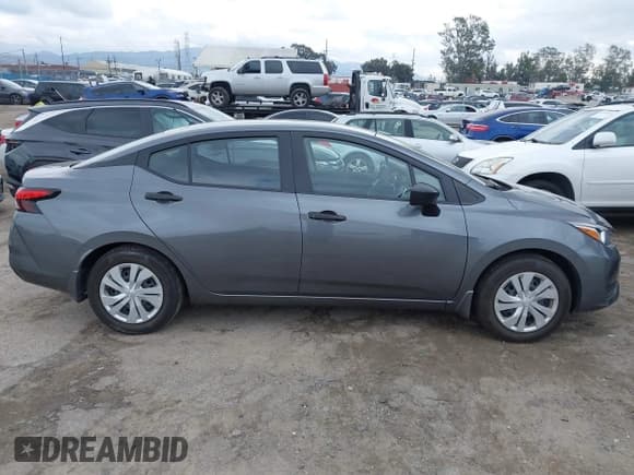 ✅ 2023 Nissan Versa S • VIN: 3N1CN8DV7PL873313 • Лот: 43752707. Опубликован ранее на IAAI с пробегом 28 223 миль. Бесплатный доступ к архиву аукционных продаж из США и подробный отчёт об истории автомобиля на DreamBid. Изображение 13.