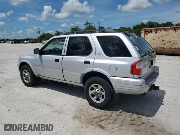 ✅ 2001 Isuzu Rodeo S • VIN: 4S2CK58W314331585 • Lot: 68416745. Listed on Copart with Not provided. Free auction sales archive from the USA and detailed vehicle history report at DreamBid. Image 2.