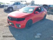 ✅ 2010 Kia Forte SX • VIN: KNAFW6A38A5116262 • Lot: 43052575. Listed on IAAI with 256,575 mi. Free auction sales archive from the USA and detailed vehicle history report at DreamBid. Image 2.