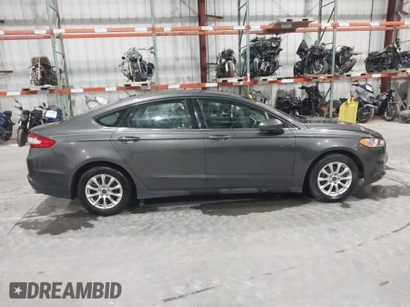 ✅ 2015 Ford Fusion S • VIN: 3FA6P0G74FR141502 • Lot: 43576144. Listed on IAAI with 231,145 mi. Free auction sales archive from the USA and detailed vehicle history report at DreamBid. Image 13.