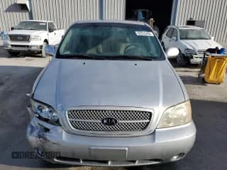 ✅ 2005 Kia Sedona LX • VIN: KNDUP132356769452 • Lot: 82835494. Wystawiony na Copart z przebiegiem 93 845 mil. Bezpłatny archiwum sprzedaży aukcyjnych z USA i szczegółowy raport historii pojazdu na DreamBid. Zdjęcie 5.
