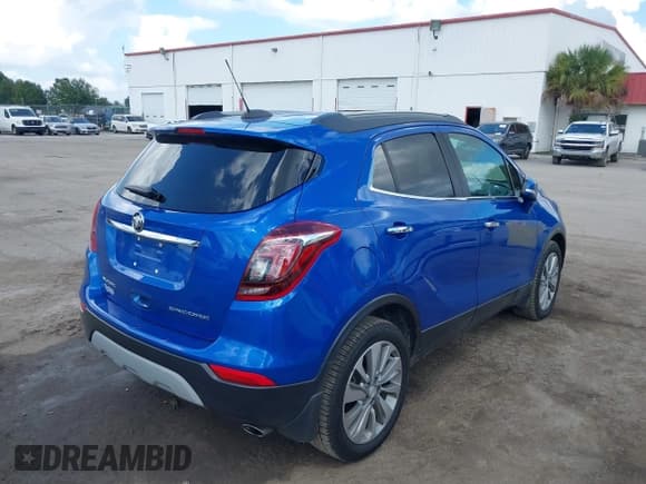 ✅ 2018 Buick Encore Preferred • VIN: KL4CJASB1JB633444 • Lot: 43324175. Listed on IAAI with 69,250 mi. Free auction sales archive from the USA and detailed vehicle history report at DreamBid. Image 4.