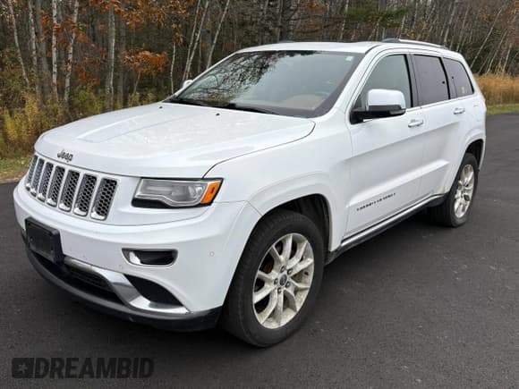 ✅ 2015 Jeep Grand Cherokee Summit • VIN: 1C4RJFJM8FC887279 • Lot: 92039305. Listed on Copart with 240,185 mi. Free auction sales archive from the USA and detailed vehicle history report at DreamBid. Image 2.