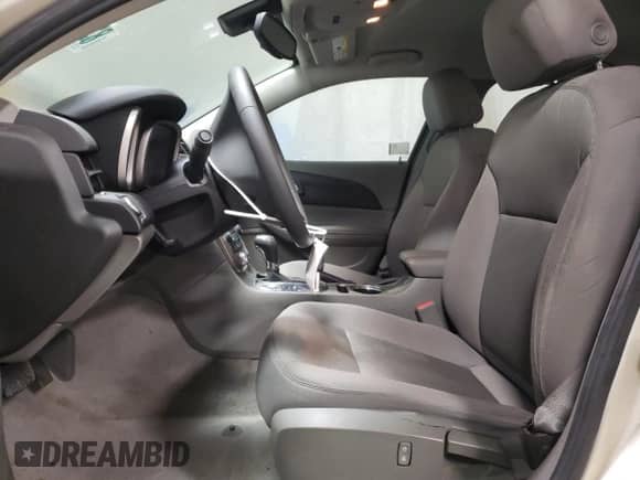 2015 Chevrolet Malibu LS with VIN 1G11B5SL9FF212283, listed as a Copart auction lot 83877934 with 55,681 mi miles and Salvage title. Bid and sale history available at DreamBid. Image 7.